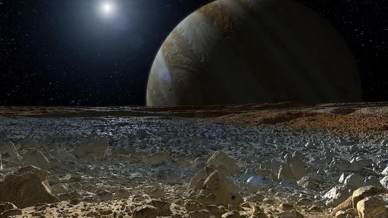 Художествена илюстрация на гледка от ледената повърхност на Европа към Юпитер. Източник: NASA / JPL-Caltech